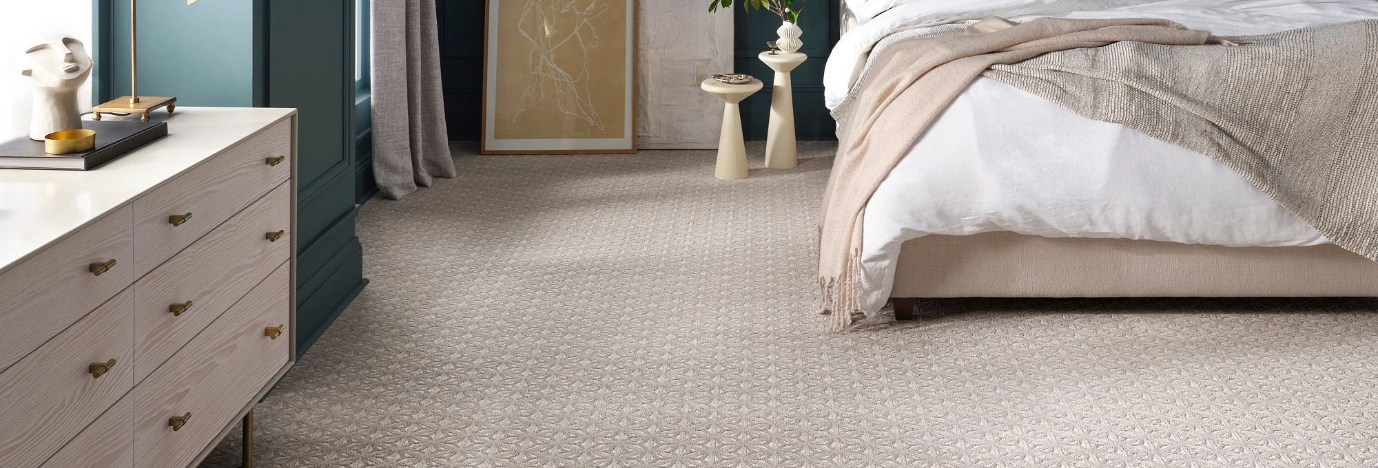 Bedroom with beige patterned carpet from Simonian Flooring Inc in Village, NV