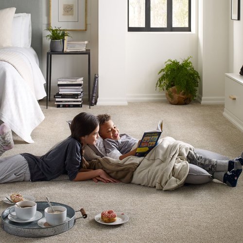 Kids reading on bedroom carpet from Simonian Flooring Inc in Village, NV