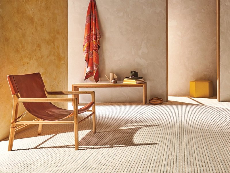 Warm living space with beige textured carpet from Simonian Flooring Inc in Village, NV