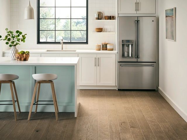 Kitchen with hardwood flooring from Simonian Flooring Inc in Village, NV